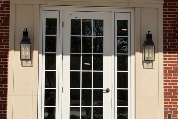 Commercial door with card reader to access elevator for golf club drop off